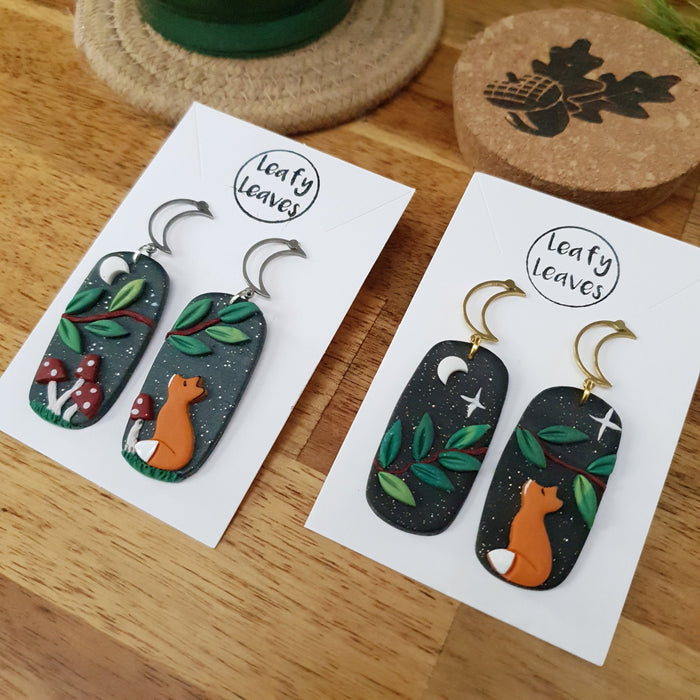 Midnight sky asymmetrical earrings with foxes and leaves or mushrooms / nature woodlands and forest