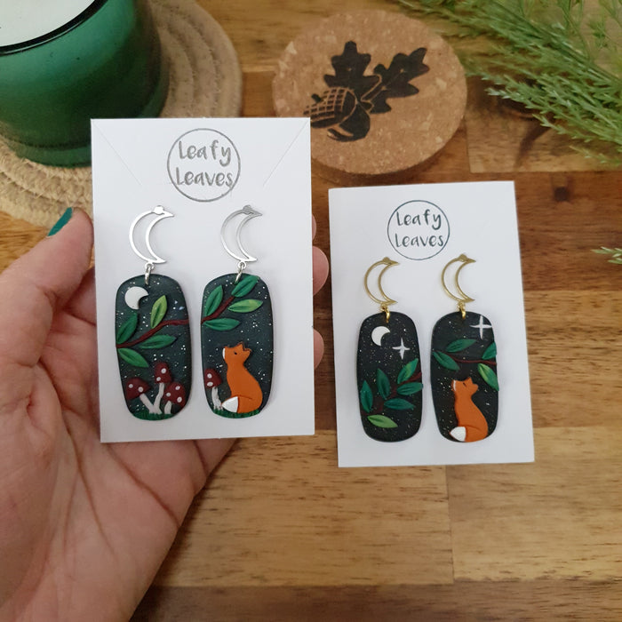 Midnight sky asymmetrical earrings with foxes and leaves or mushrooms / nature woodlands and forest