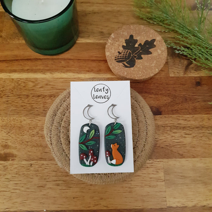 Midnight sky asymmetrical earrings with foxes and leaves or mushrooms / nature woodlands and forest