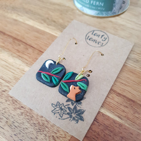 Small midnight sky asymmetrical earrings with foxes and leaves / nature woodlands and forest