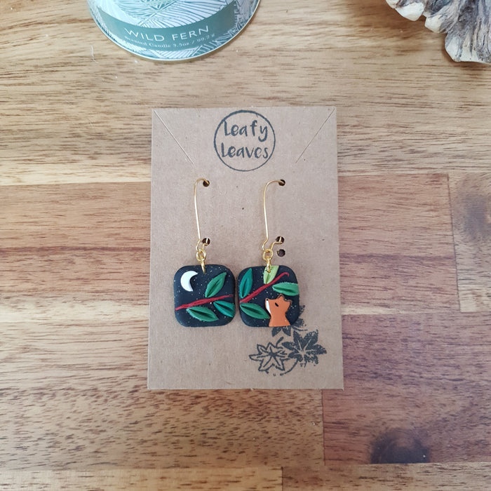 Small midnight sky asymmetrical earrings with foxes and leaves / nature woodlands and forest