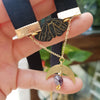 Black choker with moth, moon, and rainbow fluorite stone / handmade from polymer clay / nature jewelry pendant