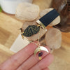 Black choker with moth, moon, and rainbow fluorite stone / handmade from polymer clay / nature jewelry pendant