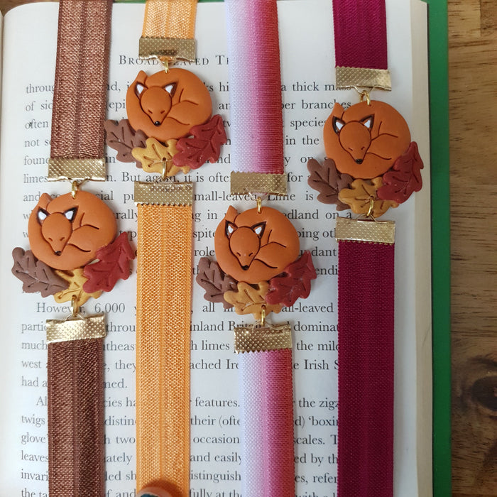Fox sleeping on Autumn leaves bookmarks in different ribbon colours / forest nature