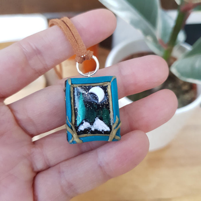 Book necklace with mountains and Northern Lights / handmade from polymer clay / nature jewelry pendant
