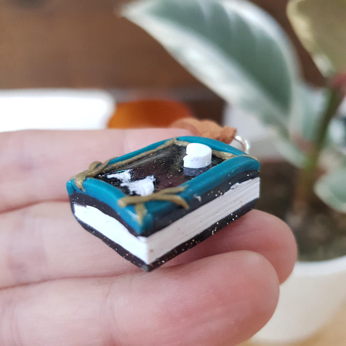 Book necklace with mountains and Northern Lights / handmade from polymer clay / nature jewelry pendant