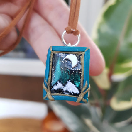 Book necklace with mountains and Northern Lights / handmade from polymer clay / nature jewelry pendant