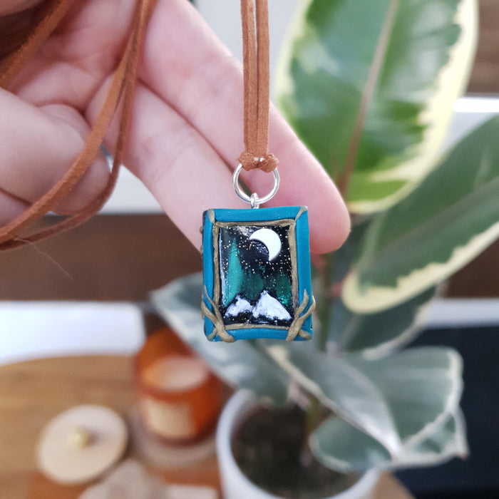 Book necklace with mountains and Northern Lights / handmade from polymer clay / nature jewelry pendant