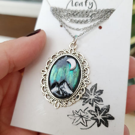 Northern lights mountains scene necklace cabochon / handmade from polymer clay / nature jewelry pendant