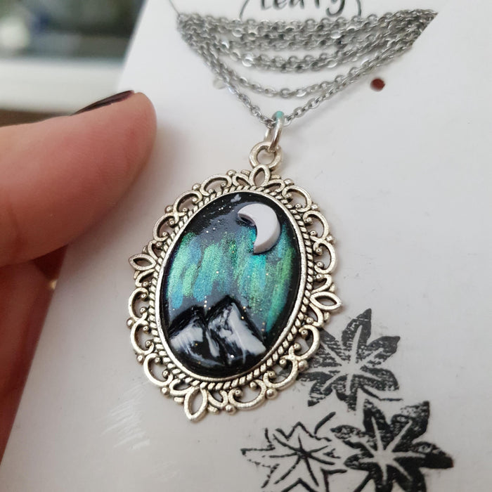 Northern lights mountains scene necklace cabochon / handmade from polymer clay / nature jewelry pendant