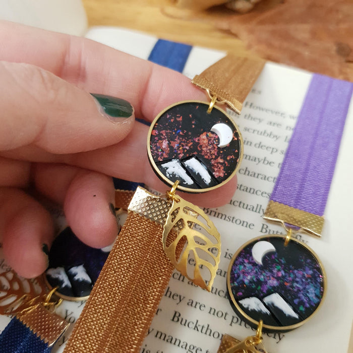 Shiny flakes background mountains elastic ribbon bookmarks / handmade from polymer clay leaves motifs forest night landscape moon bookmark