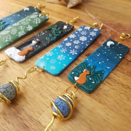 Winter oil diffuser hanging decoration with lava bead handmade from clay / winter landscape foxes