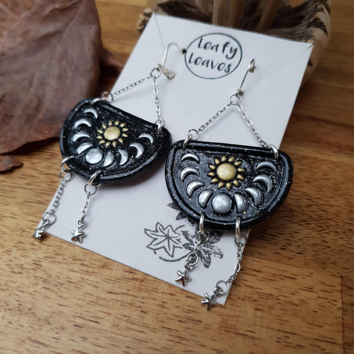 Moon phases and sun earrings / nature woodlands and forest