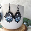 Mountains landscape black frame earrings with holographic background