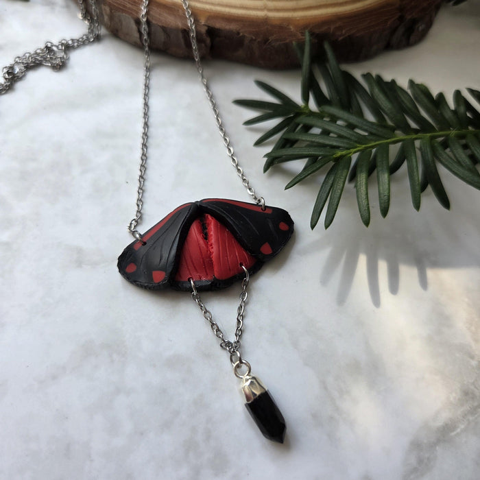 Cinnabar moth necklace with small obsidian crystal / nature woodlands and forest