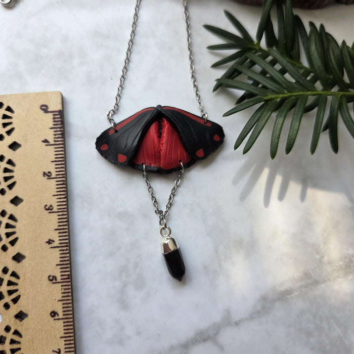 Cinnabar moth necklace with small obsidian crystal / nature woodlands and forest
