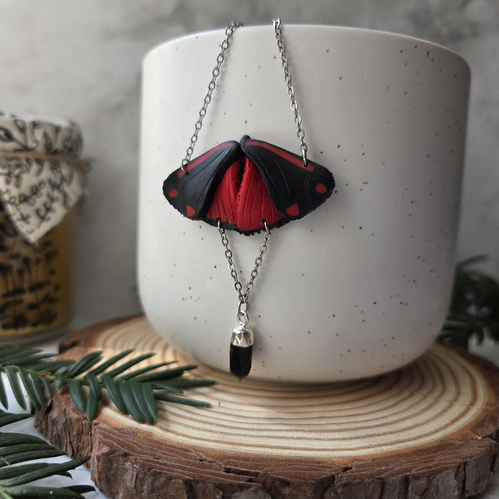 Cinnabar moth necklace with small obsidian crystal / nature woodlands and forest