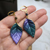 Metallic purple and green leaf earrings / nature woodlands forestcore