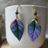 Metallic purple and green leaf earrings / nature woodlands forestcore
