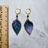 Metallic purple and green leaf earrings / nature woodlands forestcore